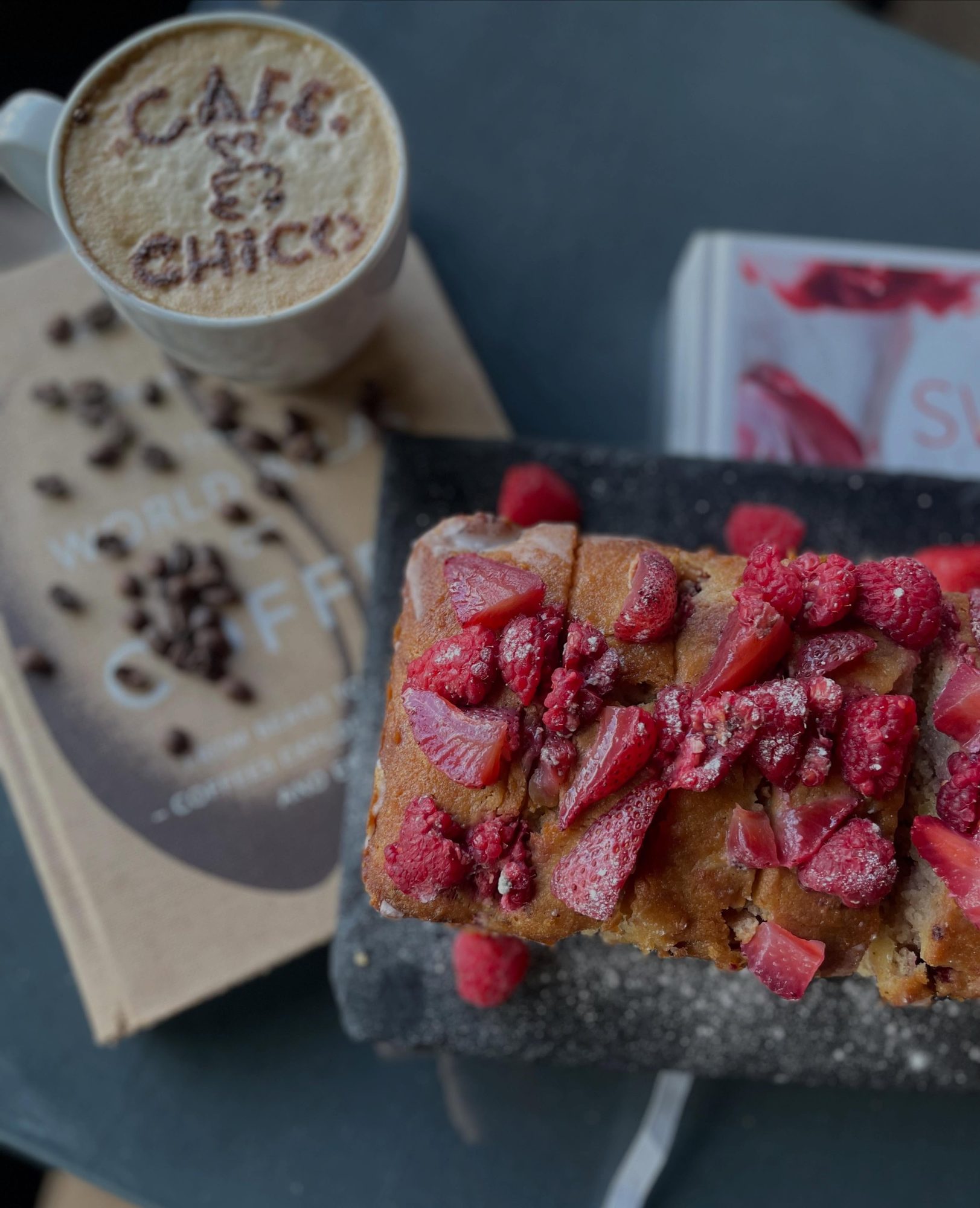 Latte with raspberry and strawberry cake