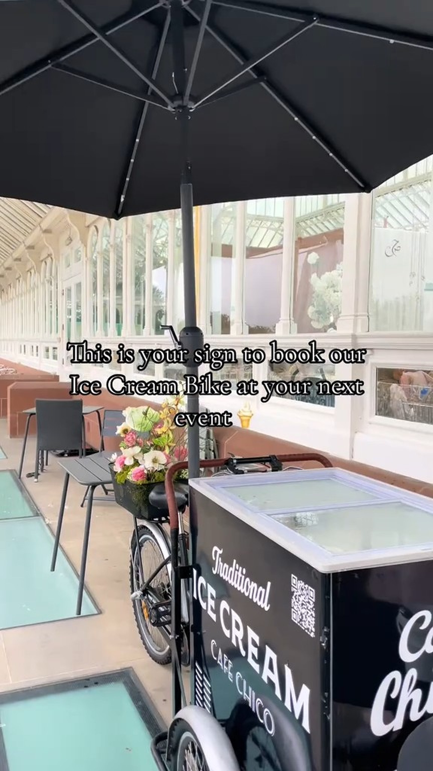 Café Chico's ice cream bike at an event with flowers in the basket